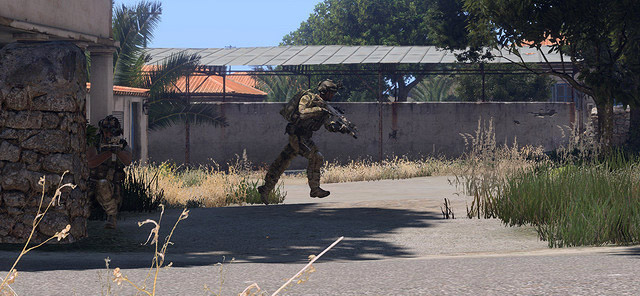 A team leader rushes across a danger area as his team provides cover